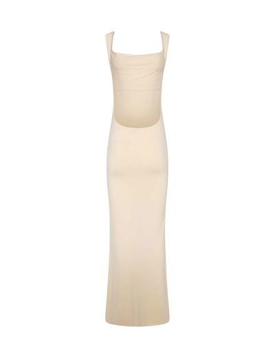 The TIGERMIST MORANA DRESS - YELLOW : BUTTER is a sleeveless, bodycon maxi dress in a butter yellow shade, featuring a square neckline and midriff cutout, displayed on a plain white background.